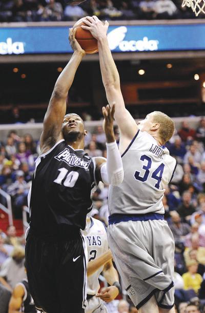 Nick Wass/AP
Nate Lubick and Georgetown held Kadeem Batts and Providence to 24.5 percent shooting from the field in a win Saturday.