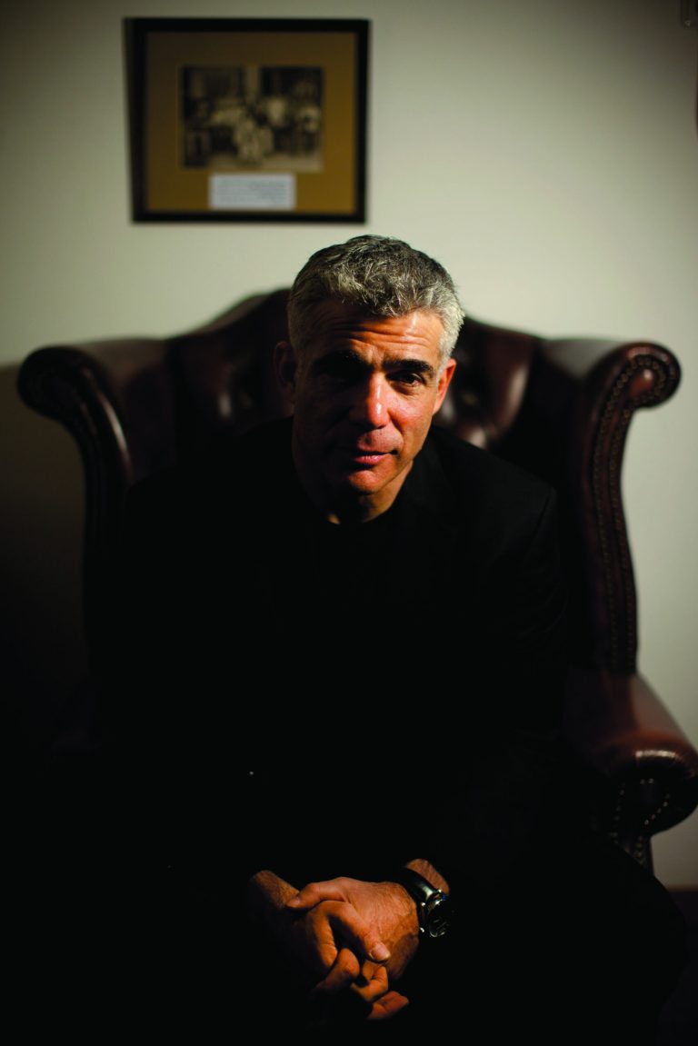 Yair Lapid, popular former TV anchorman and head of the new centrist party Yesh Atid, poses for a portrait at his house during an interview for the Associated Press in Tel Aviv, Israel, Wednesday, June. 16, 2013. Lapid predicted he will one day become prime minister and said he would fight for a more moderate policy towards the Palestinians. (AP Photo/Oded Balilty)