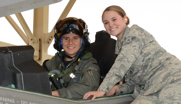 Maj. Rachael Winiecki, 461st Flight Test Squadron F-35 test pilot, and Airman 1st Class Heather Rice, 412th Aircraft Maintenance Squadron crew chief, pose for a photo right after Winiecki landed her F-35 Lightning II on her first test mission flight in the fifth-generation fighter Dec. 14, 2018. 