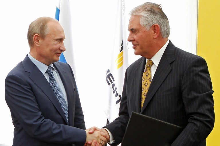 Tillerson has business ties to Russia that senators in both parties are sure to explore. (AP Photo/RIA-Novosti, Mikhail Klimentyev, Presidential Press Service)