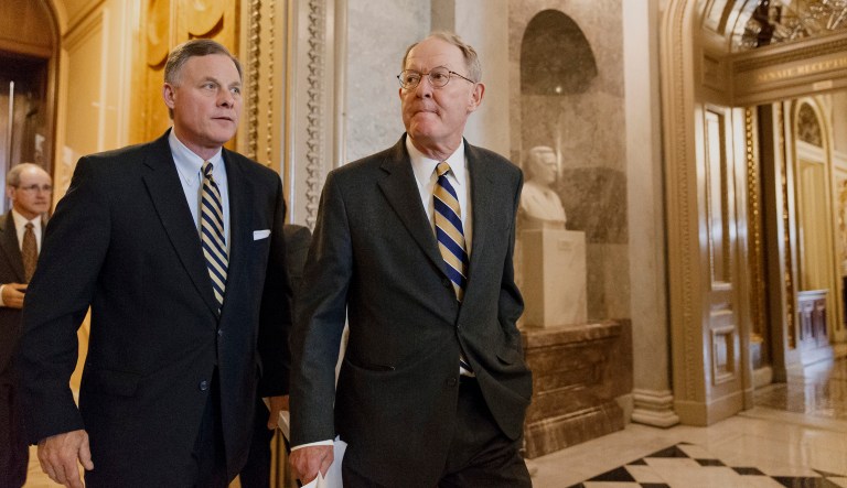 Sen. Lamar Alexander, R-Tenn., right, and Sen. Richard Burr, R-N.C., left, walk on Capitol Hill in Washington. (AP Photo/J. Scott Applewhite)