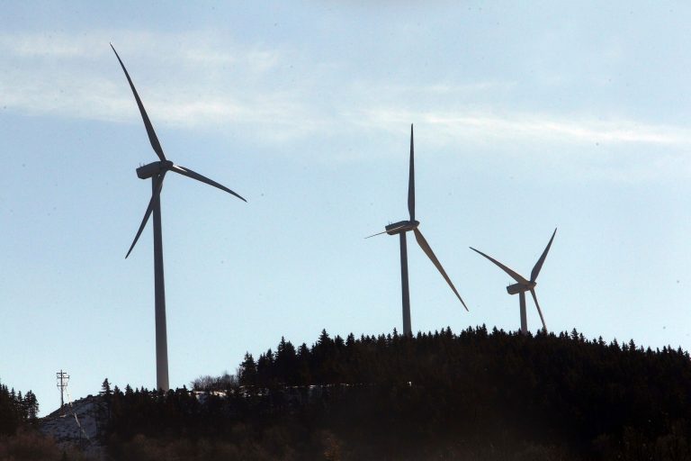 Wind turbines are seen in Rumney, N.H., in a Jan. 28 photo. (AP Photo/Jim Cole)