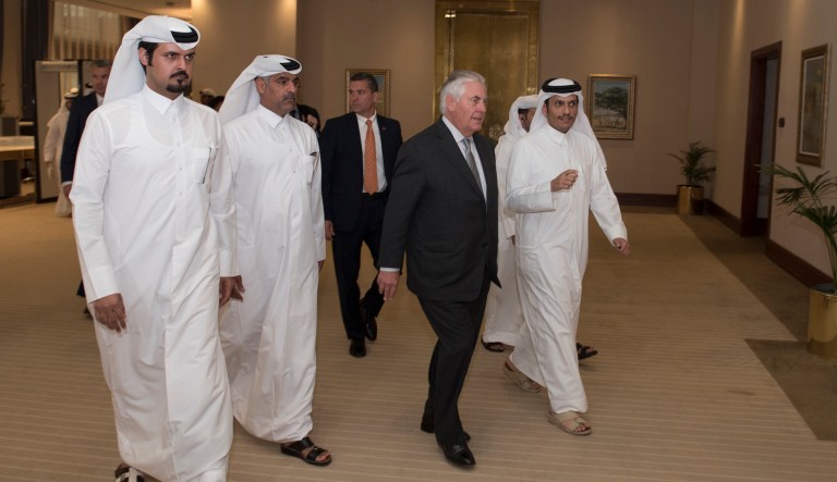 Secretary of State Rex Tillerson walks with Qatari Minister of Foreign Affairs Sheikh Mohammed bin Abdulrahman Al Thani. On June 5, Saudi Arabia, the United Arab Emirates, and Bahrain declared a full blockade of Qatar by land, sea, and air. They cited Qatar's alleged support for terrorism as justification. (Alexander W. Riedel/State Department via AP)