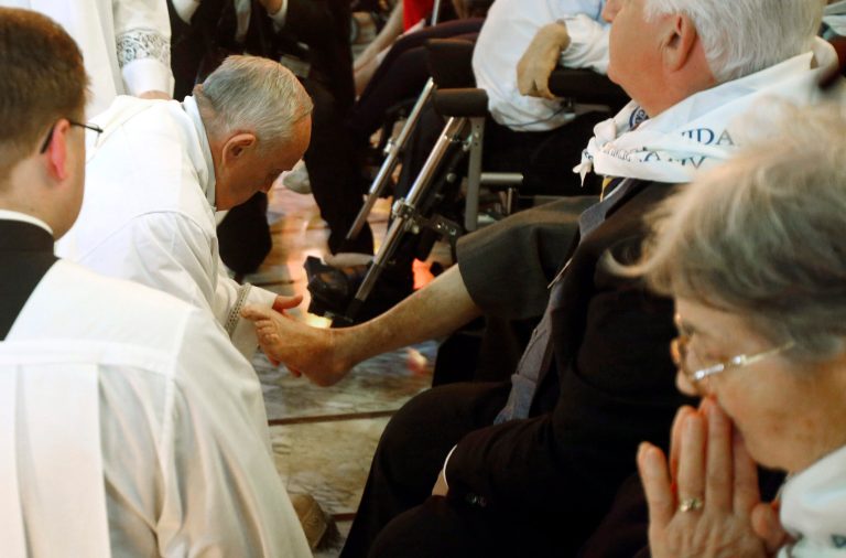 Pope washes feet of elderly, disabled in rite