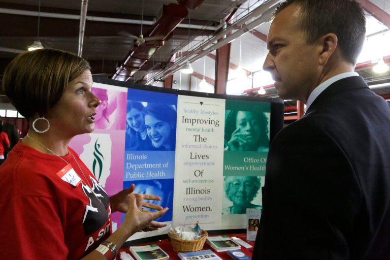 Illinois Department of Public Health, Women's Health Specialist Angela Hamm, left, and Illinois Sen. Andy Manar, D-Bunker Hill, right, participate in the 