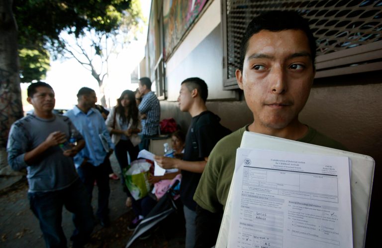 Illegal immigrant Layios Roberto waits outside the offices of Coalition for Humane Immigrant Rights in Los Angeles Aug. 15, 2012. (AP Photo/Nick Ut)