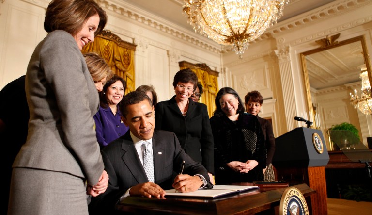 President Barack Obama signs an Executive Order creating the White House Council on Women and Girls, Wednesday, March 11, 2009, in the East Room of the White House in Washington. Assessing the need for a Council on Women and Girls is in part about good stewardship. (AP Photo/Gerald Herbert)