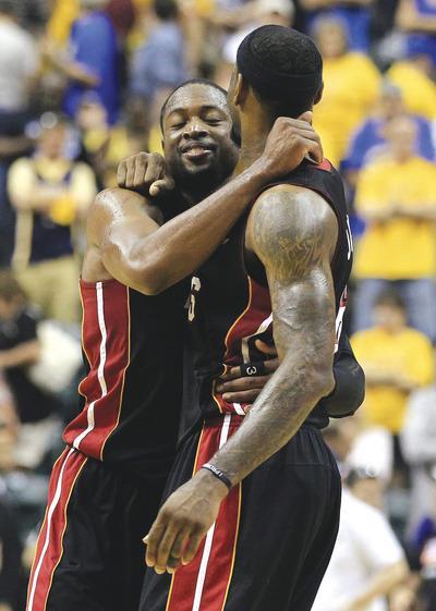 Darron Cummings/AP
Dwyane Wade and LeBron James