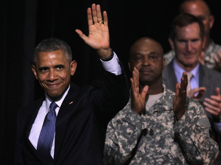 President Obama waves after signing the Veterans' Access to Care through Choice, Accountability, and Transparency Act of 2014 into law. (Getty images/Alex Wong)