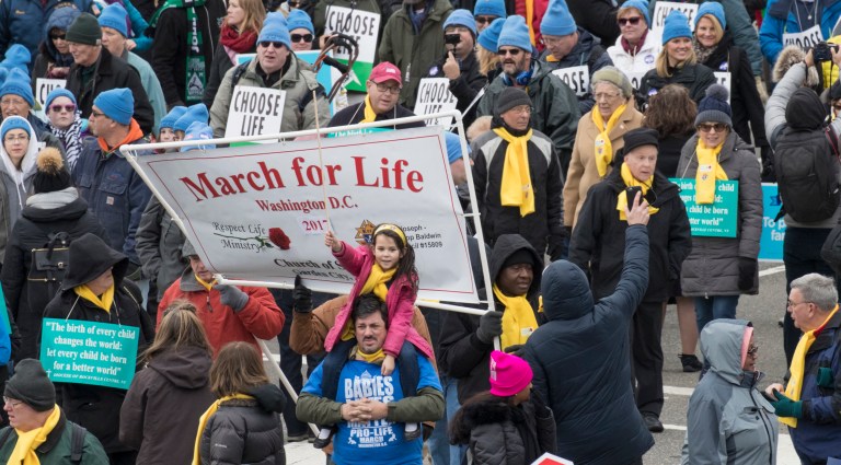 It's not clear exactly how many people attended, but organizers were hoping to attract more people than the estimated half a million who attended the women's march on Saturday. (AP Photo/J. Scott Applewhite)