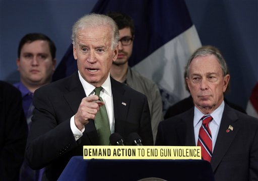 Vice President Joe Biden, left, accompanied by New York Mayor Michael Bloomberg, speaks in New York's City Hall Blue Room, Thursday, March 21, 2013. Relatives of shooting victims from Newtown, Conn., stood with Bloomberg and  Biden as they spoke in favor of an assault weapons ban. (AP Photo/Richard Drew)