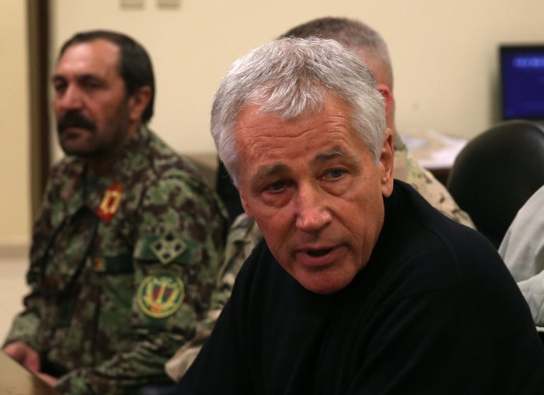 U.S. Secretary of Defense Chuck Hagel, right, speaks during a meeting with Afghan military leaders in Kandahar, Afghanistan, Sunday, Dec. 8, 2013. Hagel spoke with U.S. troops and thanked them for being deployed for the holidays. (AP Photo/Mark Wilson, Pool)