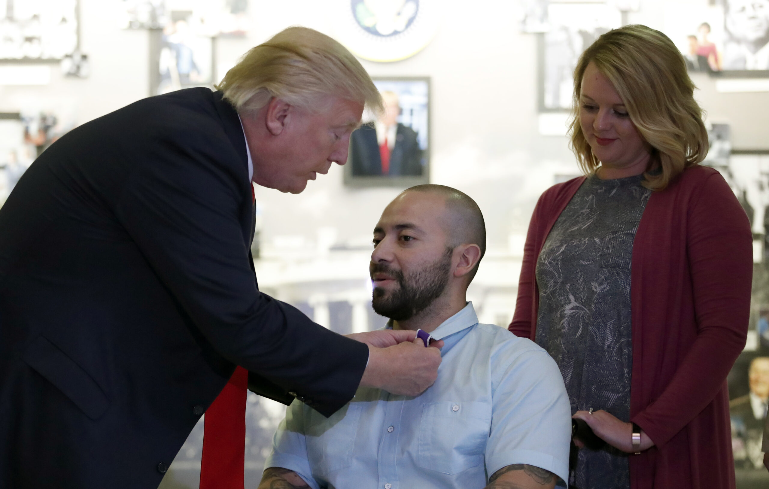 Trump awards Purple Heart to wounded service member at Walter Reed