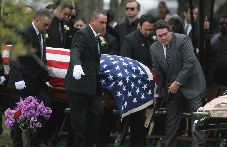 Pallbearers carry the casket of ICE agent Jaime Jorge Zapata in 2011. Two ATF officials who did not attend a hearing at which they were invited to testify Thursday on the 2011 murder of Zapata have now been subpoenaed to appear before lawmakers. (AP Photo/ Delcia Lopez)