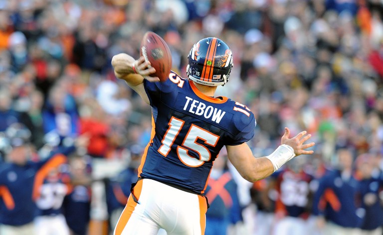 Donald Trump may have violated federal tax laws by purchasing the Tebow-autographed items with funds from his charitable foundation. (AP Photo)