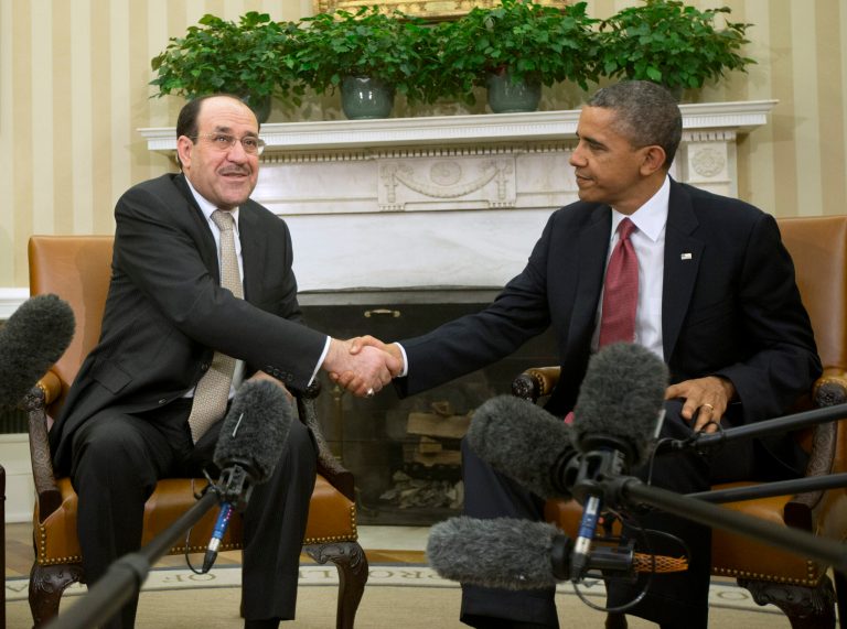 President Barack Obama and Iraqi Prime Minister Nouri al-Maliki shakes hands, Friday, Nov. 1, 2013, following their meeting in the Oval Office of the White House in Washington. The prime minister arrived at the White House Friday to personally appeal to President Barack Obama for more U.S. assistance in beating back the bloody insurgency consuming his country. (AP Photo/Pablo Martinez Monsivais)