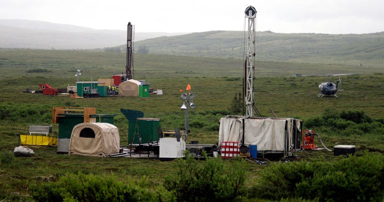 Workers drill test holes at the Pebble Mine near Bristol Bay in Southwest, Alaska. (AP/Al Grillo)