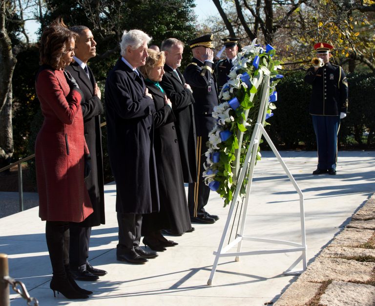 President Barack Obama, first lady Michelle Obama, former President Bill Clinton and his wife former Secretary of State Hillary Rodham Clinton, along with members of the Kennedy family, pause during a wreath laying ceremony in honor of President John F. Kennedy, Wednesday, at Arlington National Cemetery in Arlington, Va. Friday will mark the 50th anniversary of the Kennedy assassination. (AP/Pablo Martinez Monsivais)