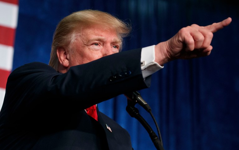 Donald Trump said he is convinced Attorney General Loretta Lynch is trying to protect Democratic rival Hillary Clinton. (AP Photo/ Evan Vucci)