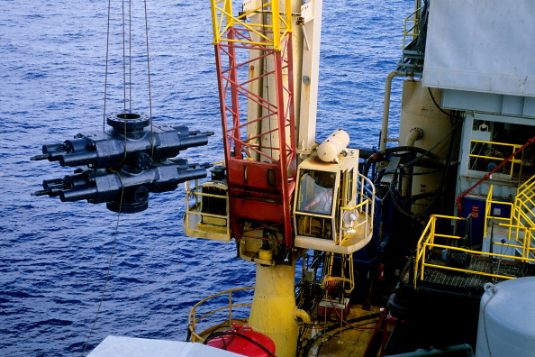 Crane lifting blowout preventer (BOP) from the ocean. (Photo by: Education Images/UIG via Getty Images)