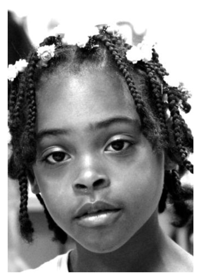 FILE - This undated file photo provided by the Washington Metropolitan Police Department shows 8-year old Relisha Tenau Rudd. A review of interactions between the District of Columbia government and the family of a missing 8-year-old girl has recommended more than two dozen policy changes but concluded that none of those reforms would have prevented her disappearance. Rudd was last seen on March 1 in the company of a janitor at the homeless shelter where the girl lived with her mother and brothers. Relisha's family had allowed her to spend time with Khalil Tatum. After Relisha was reported missing, the body of Tatum's wife was found in a motel, and Tatum was later found dead of a self-inflicted gunshot wound. (AP Photo/Washington Metropolitan Police Department, File)