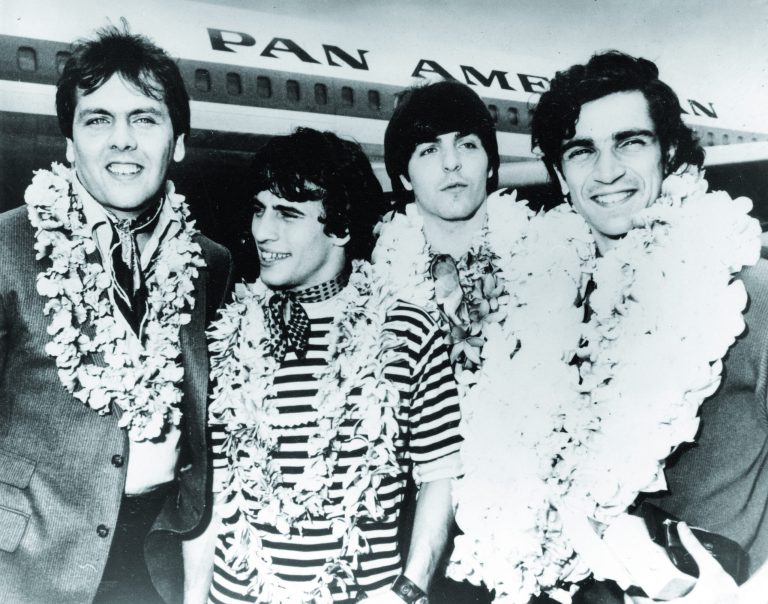 FILE - This Feb. 26, 1968 file image shows, from left, Gene Cornish, Eddie Brigati, Dino Danelli and Felix Cavaliere from the American rock group The Rascals at JFK Airport in New York, after a trip to Hawaii. The group, gave us 