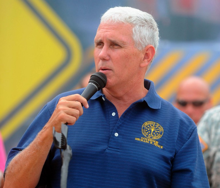 Gov. Mike Pence speaks at the Walmart Distribution Center in Seymour, Ind., on Friday, July 25, 2014. (AP Photo/The Seymour Tribune, Aaron Piper)