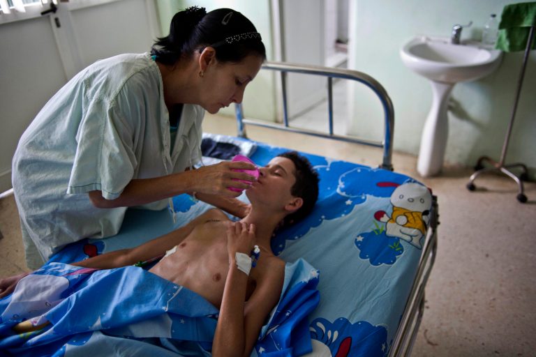 In Cuba, there are really two healthcare systems: One for visiting foreigners who pay, and a free one for ordinary Cubans. (AP Photo/Ramon Espinosa)