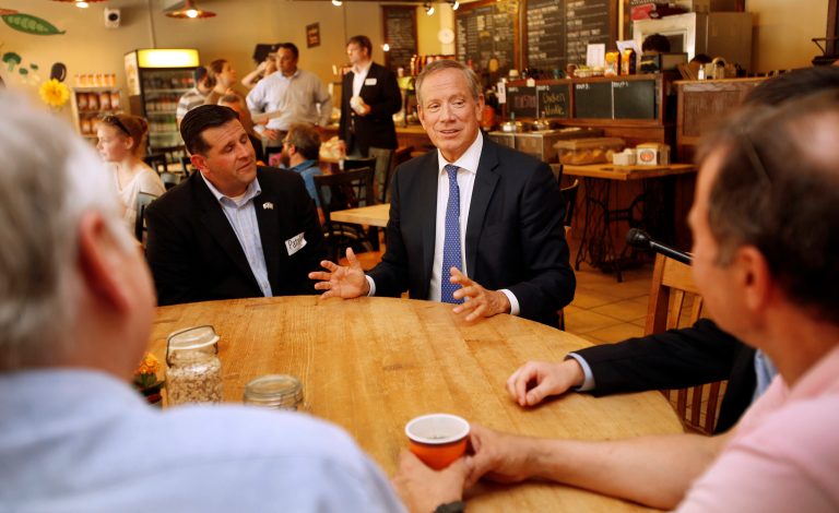 Republican presidential candidate, former New York Gov. George Pataki meets with supporters at a coffee shop after announcing his plans to seek the Republican nomination for president, Thursday, May 28, 2015, in Exeter, N.H. (AP Photo/Jim Cole)