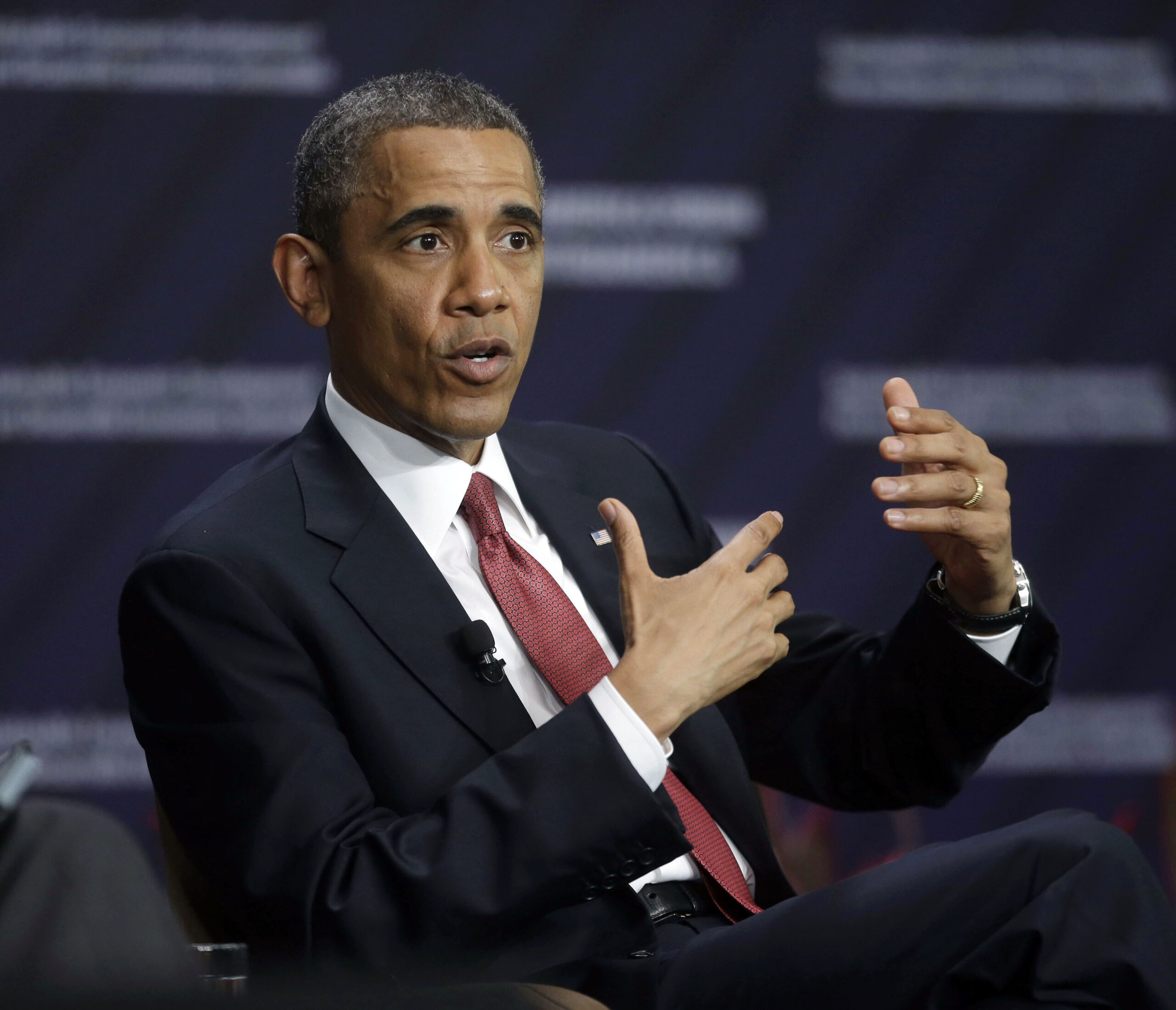 Issues back home trail Obama on Latin America trip