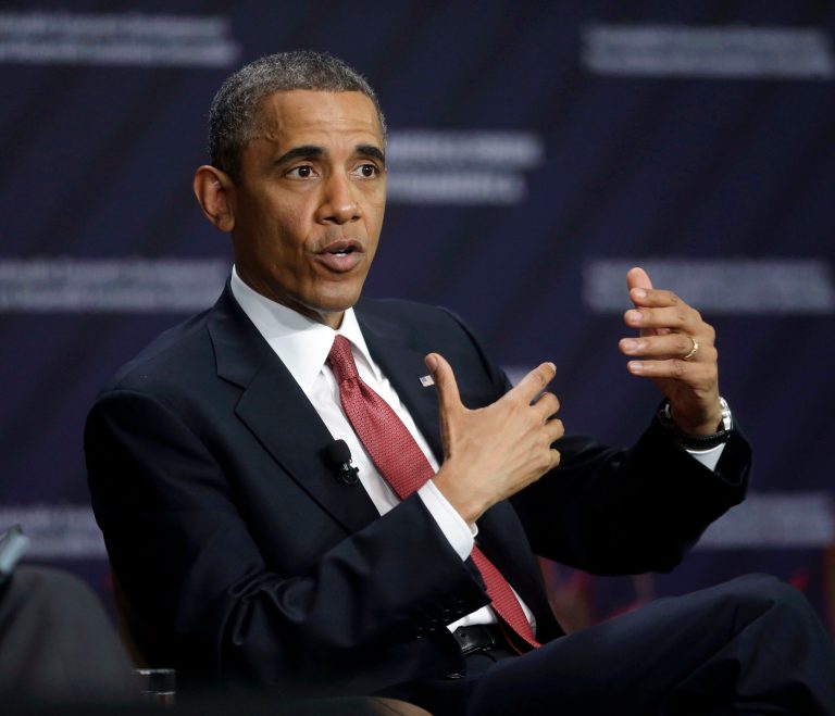 U.S. President Barack Obama answers a question during a forum on Inclusive Economic Growth and Development at the Old Custom House in San Jose, Costa Rica, Saturday, May 4, 2013. Concluding his three-day visit to Mexico and Costa Rica, Obama cheered Mexican economic advances and pressed for other Central American leaders to deal with poverty and security, while reaching out to a politically powerful Latino audience back home. (AP Photo/Pablo Martinez Monsivais)