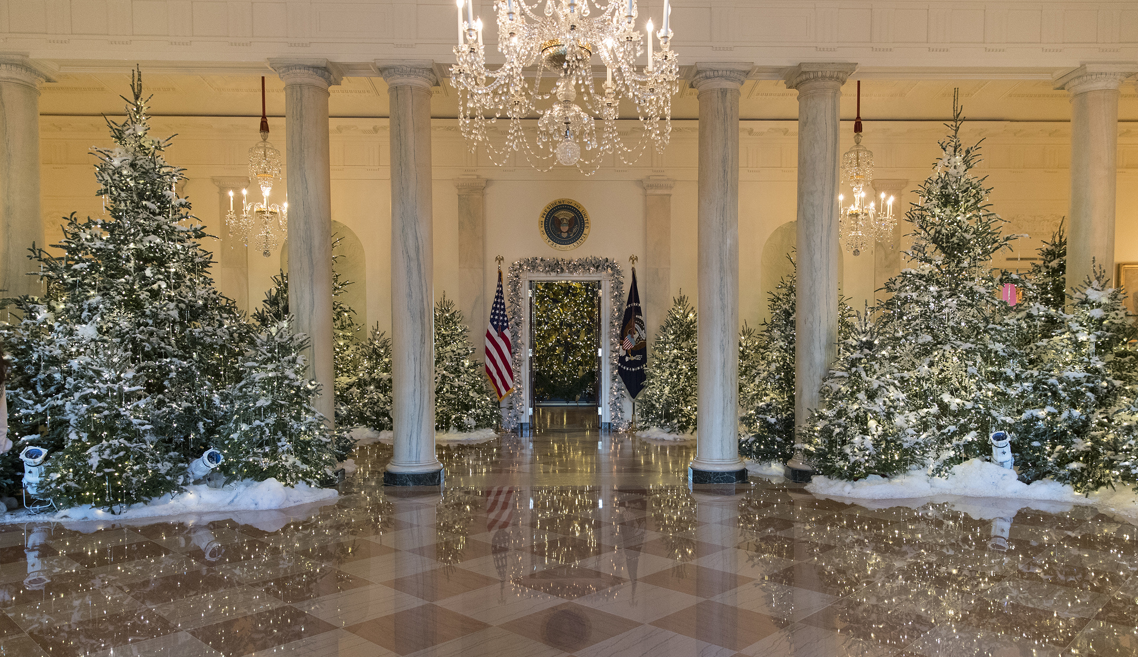 White House’s holiday display includes 53 Christmas trees, and honors for the military