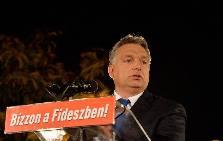 Hungarian Prime Minister Viktor Orban delivers a speech after incumbent mayor of Budapest Istvan Tarlos and candidate of the ruling centre-right Fidesz party won the mayoral election in Budapest, Hungary, Sunday, Oct. 12, 2014. Orban's Fidesz was the clear winner in Sunday's nationwide municipal elections, with the left-wing opposition making only some gains in Budapest and candidates from the far-right Jobbik party winning in several rural cities. (AP Photo/MTI, Szilard Koszticsak)