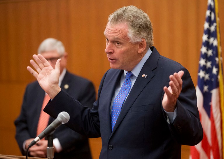 Terry McAuliffe's well-timed donations came after the discovery of the private email server that Hillary Clinton kept in her basement while she led the State Department. (AP Photo)