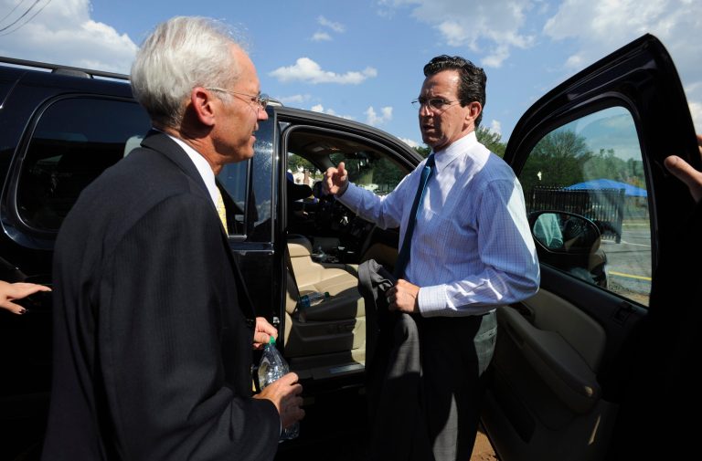 Connecticut Gov. Dannel P. Malloy, right, speaks with ESPN Executive Vice President of Administration Ed Durso after a ground-breaking for a new building on the ESPN campus in Bristol, Conn. on Aug. 2, 2011. ESPN receives hundreds of millions of dollars in state incentives from Connecticut. (AP Photo/Jessica Hill)