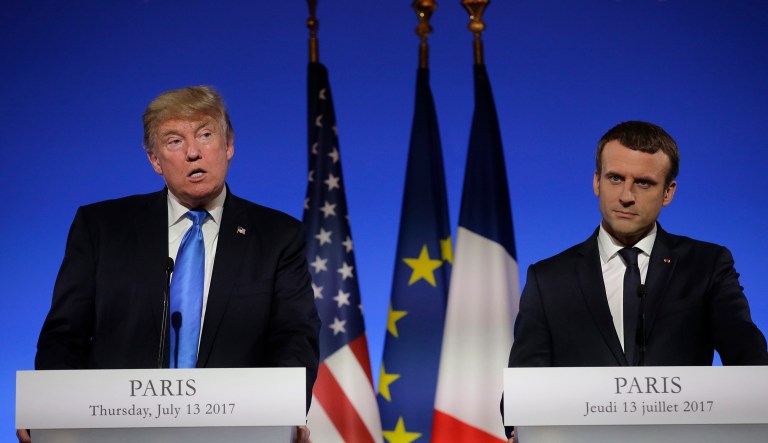 President Trump, left, speaks during a press conference with French President Emmanuel Macron at the Elysee Palace in Paris, Thursday, July 13, 2017. President Donald Trump is saluting the United States' 