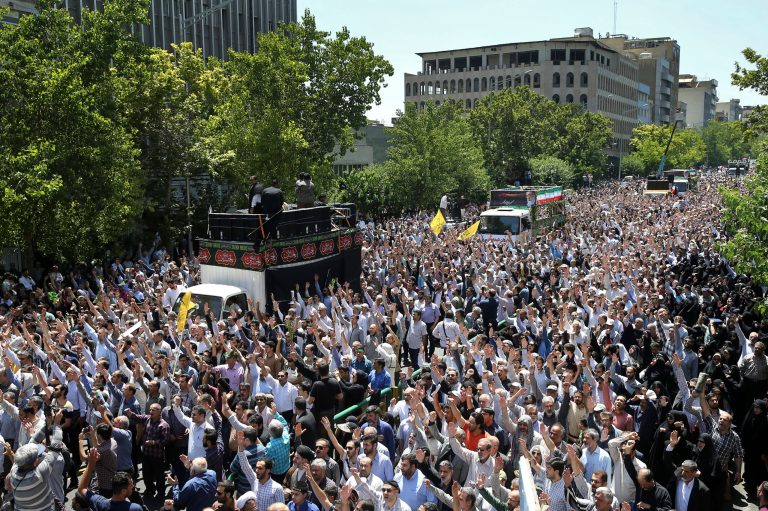 Iranians attend the funeral of victims of an Islamic State militant attack on Wednesday, in Tehran, Iran, Friday, June 9, 2017. (AP Photo/Ebrahim Noroozi)