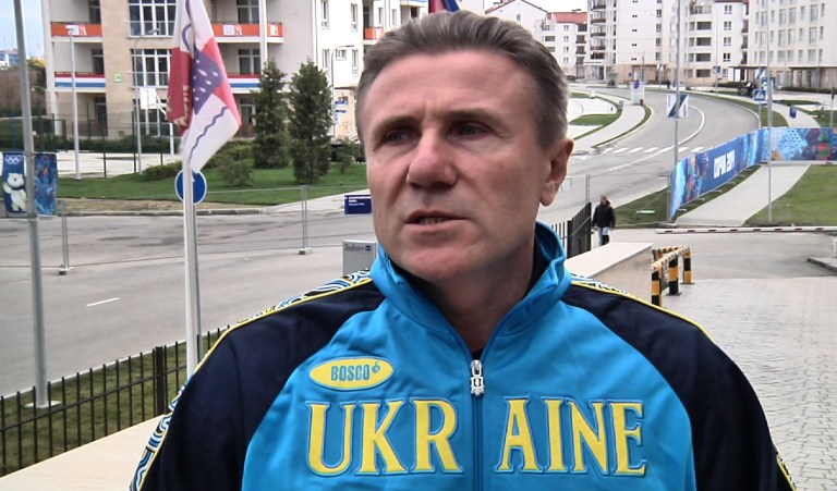 Ukrainian pole vault great Sergei Bubka is interviewed outside the headquarters hotel of the International Olympic Committee, at the 2014 Winter Olympics, in Sochi Russia on Wednesday, Feb. 19, 2014. Bubka appealed Wednesday to both sides in his homeland's political crisis to halt the violence that has claimed dozens of lives and brought the country 