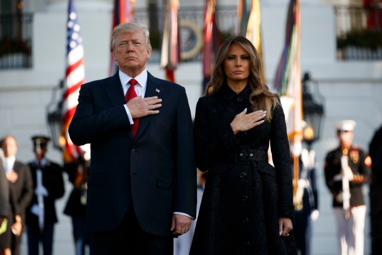 President Donald Trump and first lady Melania Trump stand for a moment of silence to mark the anniversary of the Sept. 11 terrorist attacks, on the South Lawn of the White House, Monday, Sept. 11, 2017, in Washington. (AP Photo/Evan Vucci)