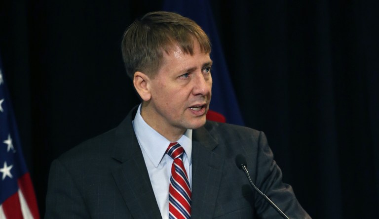 CFPB Director Richard Cordray argued Tuesday that consumers should be able to sue banks as a group, and should be freed from financial contracts that prevent them from doing so. (AP Photo/Brennan Linsley)