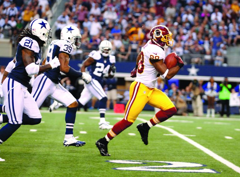 Tim Sharp/AP
Washington Redskins wide receiver Pierre Garcon scored on a 59-yard touchdown catch Thursday vs. the Cowboys.