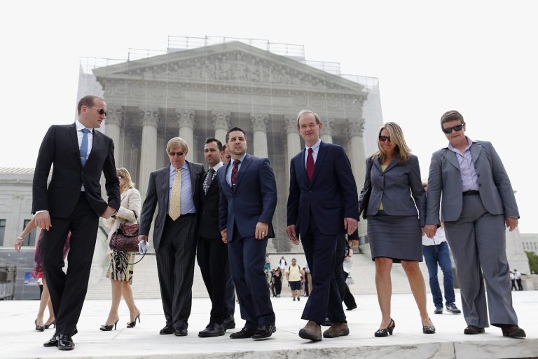 From second from left: Attorney Ted Olson; Proposition 8 plaintiffs Jeffrey Zarrillo and Paul Katami; attorney David Boies, co-lead counsel of the legal team challenging California's same-sex marriage ban; and plaintiffs Sandy Stier and Kris Perry walk out of the Supreme Court on Monday. (AP/Charles Dharapak)