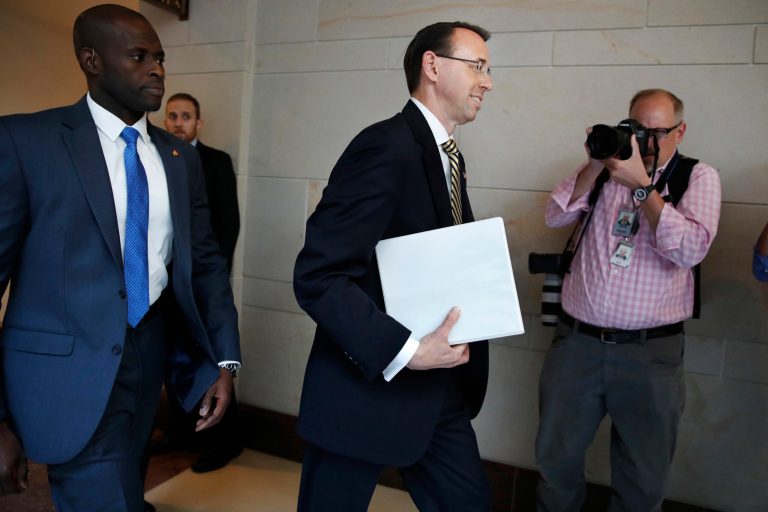 Deputy Attorney General Rod Rosenstein's, center, memo was initially cited as President Trump's primary reason for firing former FBI Director James Comey. (AP Photo/Jacquelyn Martin)