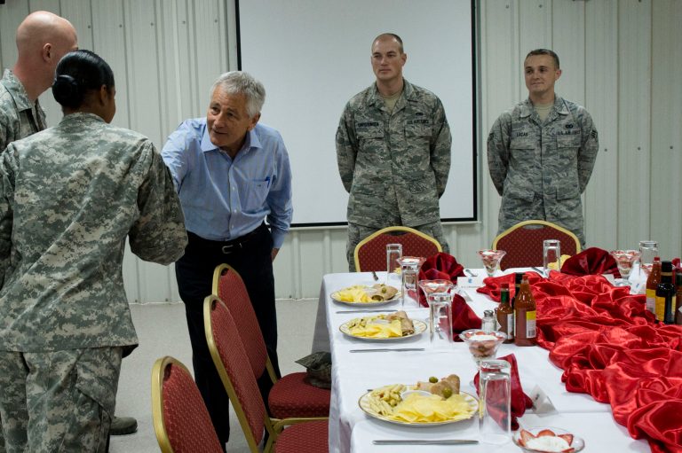 Secretary of Defense Chuck Hagel greets troops before sitting down for lunch at an undisclosed location in South East Asia, April 25, 2013. Hagel has been lunching with troops regularly in his effort to keep an eye on their morale and needs. (Photo by Erin A. Kirk-Cuomo)