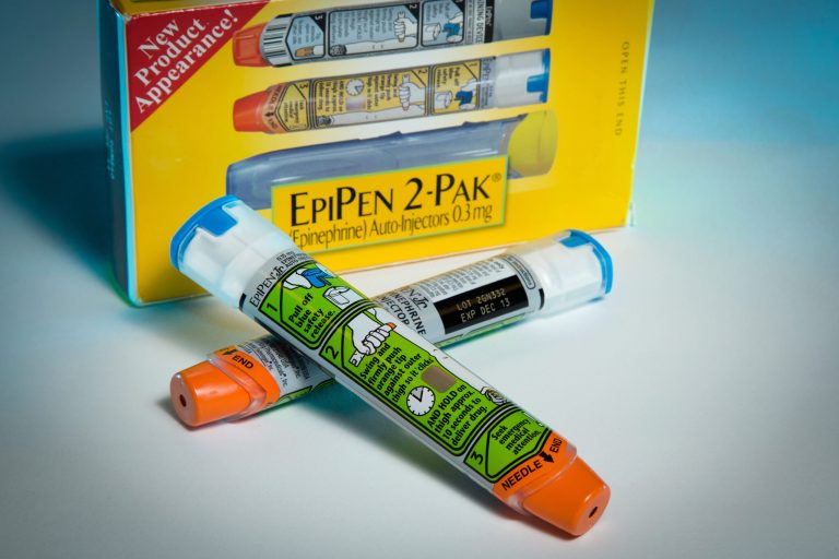 Examples of epinephrine pens that the Center for Disease Control and  Prevention guidelines recommend that schools stock to combat food allergies are photographed in the Washington Wednesday, Nov. 13, 2013. The deaths of two girls in Illinois and Virginia from severe food allergies have helped spur efforts to get schools to stockpile emergency medications that can save lives. That effort has now reached the highest level: President Barack Obama's desk. The president was expected to sign a bipartisan bill that offers a financial incentive to states if schools stockpile epinephrine, considered the first-line treatment for people with severe allergies. The medication is administered by injection, through preloaded EpiPens or similar devices. (AP Photo/J. David Ake)