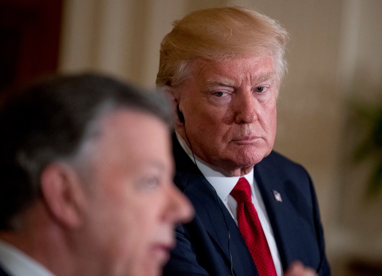 —œI respect the move, but the entire thing has been a witch hunt,—? Trump said at an appearance with Colombian President Juan Manual Santos. (AP Photo/Andrew Harnik)