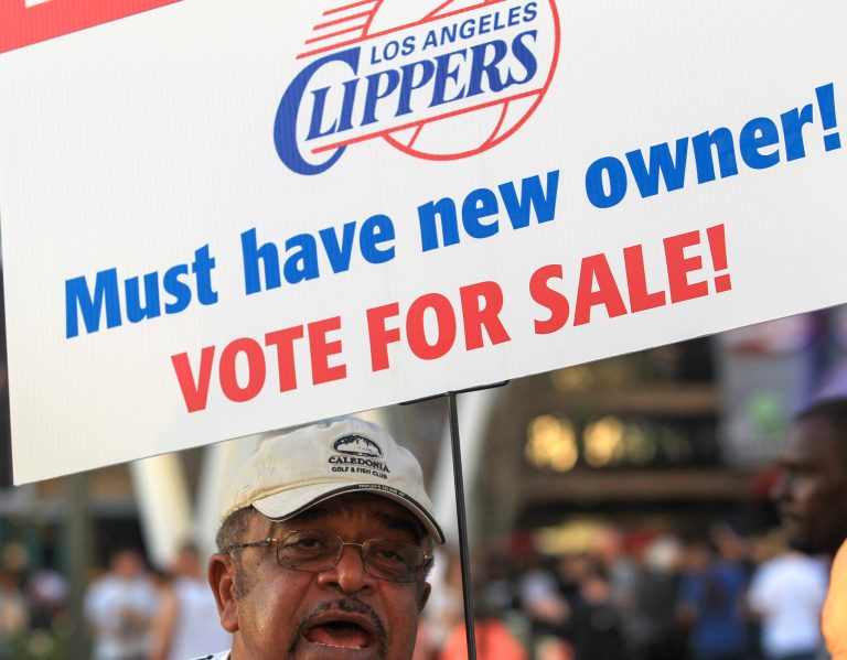 Sam Wright protests against Los Angeles Clippers owner Donald Sterling, outside Staples Center before Game 5 of the Clippers' opening-round NBA basketball playoff series against the Golden State Warriors on Tuesday in Los Angeles. (AP Photo/Ringo H.W. Chiu)
