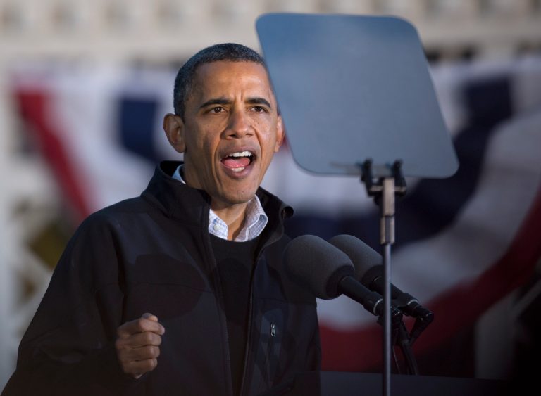 President Barack Obama looks to his Teleprompter as he speaks at a campaign event in Washington Park, Saturday, Nov. 3, 2012, in Dubuque, Iowa, before traveling traveling back to Washington. (AP Photo/Carolyn Kaster)