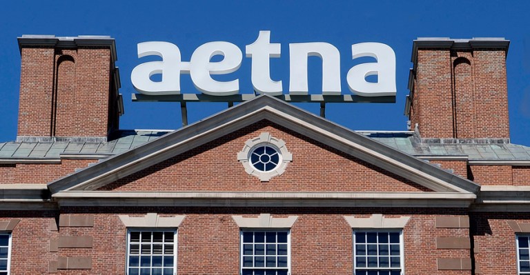 Aetna's specific concerns are over constricting regulations and lax enforcement of Obamacare delinquents. (AP photo/Jessica Hill, file)