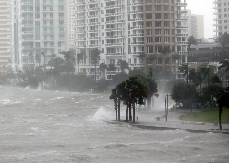 Waves crash over a seawall at the mouth of the Miami River from Biscayne Bay, Fla., as Hurricane Irma passes by, Sunday, Sept. 10, 2017, in Miami. (AP Photo/Wilfredo Lee)